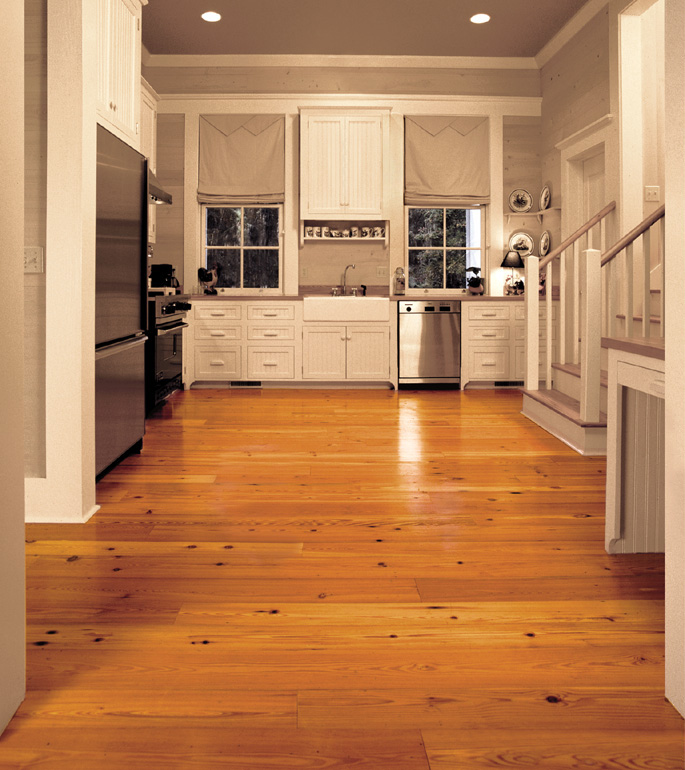 Antique Reclaimed Heart Pine solid wood flooring in a contemporary kitchen