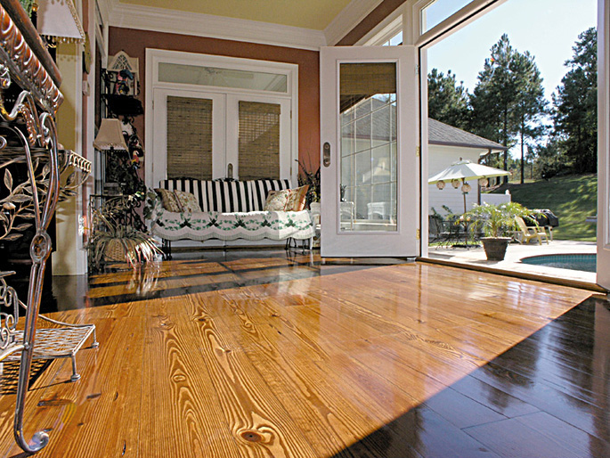 Wide Plank Southern Pine flooring, random widths, stained and finished for a pool cabana