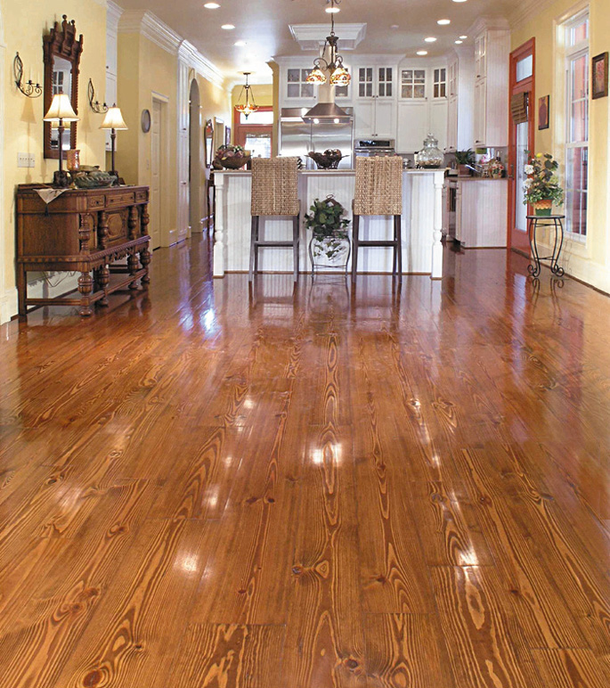 Wide Plank Southern Pine flooring, random widths, in a island kitchen